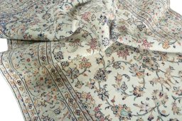 Surface texture of 2000s Kashan rug with natural Wool and intricate pattern