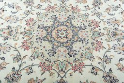 Central medallion detail of 2000s Kashan rug from Iran / Persia