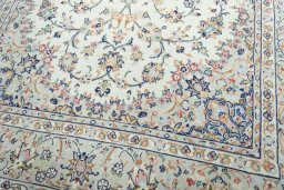 Close-up detail of 2000s Kashan rug from Iran / Persia showing Wool weave