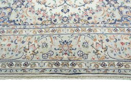 Full view of 2000s Kashan rug from Iran / Persia, 306 × 196 cm in Beige tones