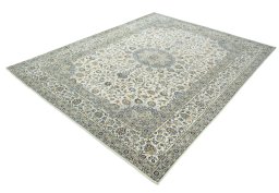 Corner detail of 2000s Kashan rug showing border pattern and Wool pile