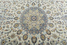 Central medallion detail of 2000s Kashan rug from Iran / Persia