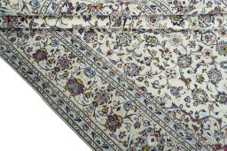 Close-up detail of 2000s Kashan rug from Iran / Persia showing Wool weave