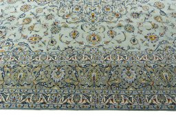 Corner detail of 1970s Kashan rug showing border pattern and Wool pile