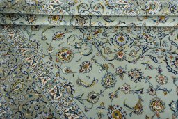 Close-up detail of 1970s Kashan rug from Iran / Persia showing Wool weave