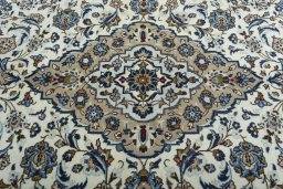 Central medallion detail of 2000s Kashan rug from Iran / Persia