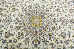 Central medallion detail of 2000s Kashan rug from Iran / Persia