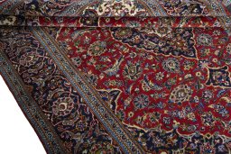 Close-up detail of 2000s Kashan rug from Iran / Persia showing Wool weave