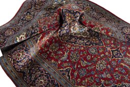 Surface texture of 2000s Kashan rug with natural Wool and intricate pattern