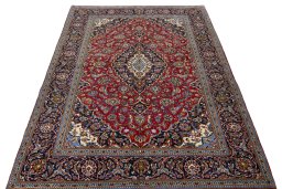 Surface texture of 2000s Kashan rug with natural Wool and intricate pattern