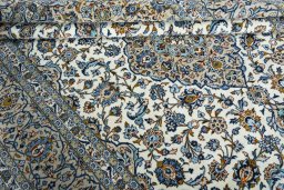 Close-up detail of 2000s Kashan rug from Iran / Persia showing Wool weave