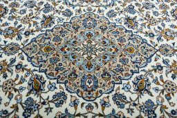 Central medallion detail of 2000s Kashan rug from Iran / Persia