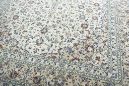 Close-up detail of 2000s Kashan rug from Iran / Persia showing Wool weave
