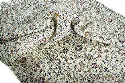 Surface texture of 2000s Kashan rug with natural Wool and intricate pattern
