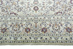 Full view of 2000s Kashan rug from Iran / Persia, 301 × 197 cm in Beige tones