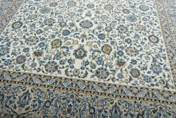 Close-up detail of 2000s Kashan rug from Iran / Persia showing Wool weave