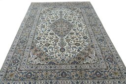 Surface texture of 2000s Kashan rug with natural Wool and intricate pattern