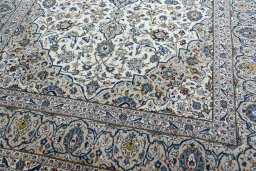 Close-up detail of 2000s Kashan rug from Iran / Persia showing Wool weave