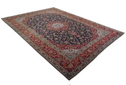 Close-up detail of 2000s Kashan rug from Iran / Persia showing Wool weave