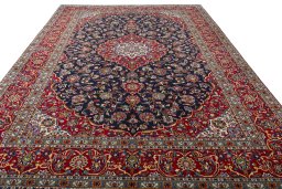 Surface texture of 2000s Kashan rug with natural Wool and intricate pattern