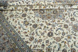 Close-up detail of 2000s Kashan rug from Iran / Persia showing Wool weave