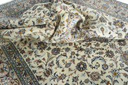 Surface texture of 2000s Kashan rug with natural Wool and intricate pattern