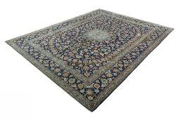 Corner detail of 2000s Kashan rug showing border pattern and Wool pile