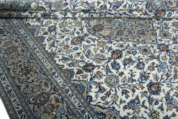 Close-up detail of 2000s Kashan rug from Iran / Persia showing Wool weave