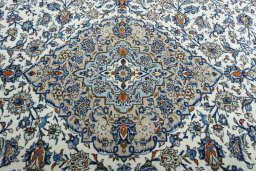 Central medallion detail of 2000s Kashan rug from Iran / Persia