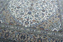 Close-up detail of 2000s Kashan rug from Iran / Persia showing Wool weave