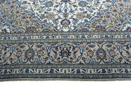 Full view of 2000s Kashan rug from Iran / Persia, 407 × 296 cm in Beige tones