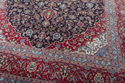 Close-up detail of 2000s Kashan rug from Iran / Persia showing Wool weave