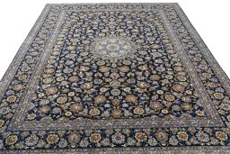 Surface texture of 2000s Kashan rug with natural Wool and intricate pattern