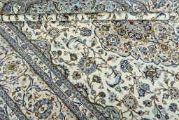 Close-up detail of 2000s Kashan rug from Iran / Persia showing Wool weave