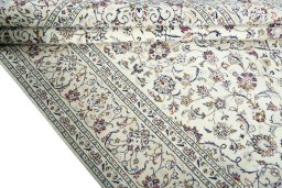 Close-up detail of 2000s Kashan rug from Iran / Persia showing Wool weave