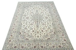 Surface texture of 2000s Kashan rug with natural Wool and intricate pattern