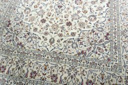 Close-up detail of 2000s Kashan rug from Iran / Persia showing Wool weave
