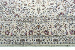 Full view of 2000s Kashan rug from Iran / Persia, 310 × 202 cm in Beige tones