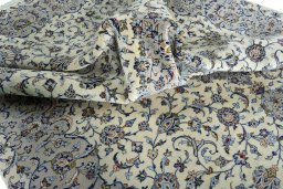 Surface texture of New Kashan rug with natural Cork and intricate pattern