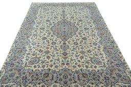 Surface texture of New Kashan rug with natural Cork and intricate pattern