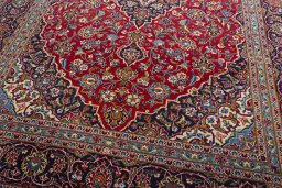 Close-up detail of 2000s Kashan rug from Iran / Persia showing Wool weave