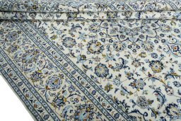 Close-up detail of 2000s Kashan rug from Iran / Persia showing Wool weave