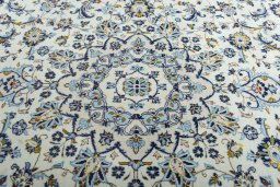 Central medallion detail of 2000s Kashan rug from Iran / Persia