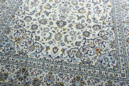 Close-up detail of 2000s Kashan rug from Iran / Persia showing Wool weave