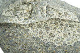 Surface texture of 2000s Kashan rug with natural Wool and intricate pattern
