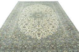 Surface texture of 2000s Kashan rug with natural Wool and intricate pattern