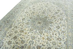 Backside of handmade 2000s Kashan rug showing knot structure and weave density