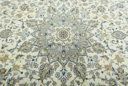 Central medallion detail of 2000s Kashan rug from Iran / Persia