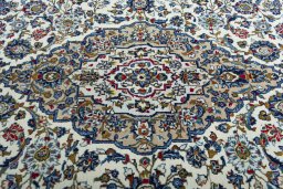 Central medallion detail of 2000s Kashan rug from Iran / Persia