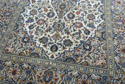 Close-up detail of 2000s Kashan rug from Iran / Persia showing Wool weave